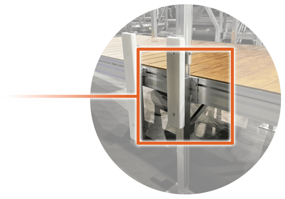 Close-up of reinforced modular stage platform corner support for enhanced stability and safety.